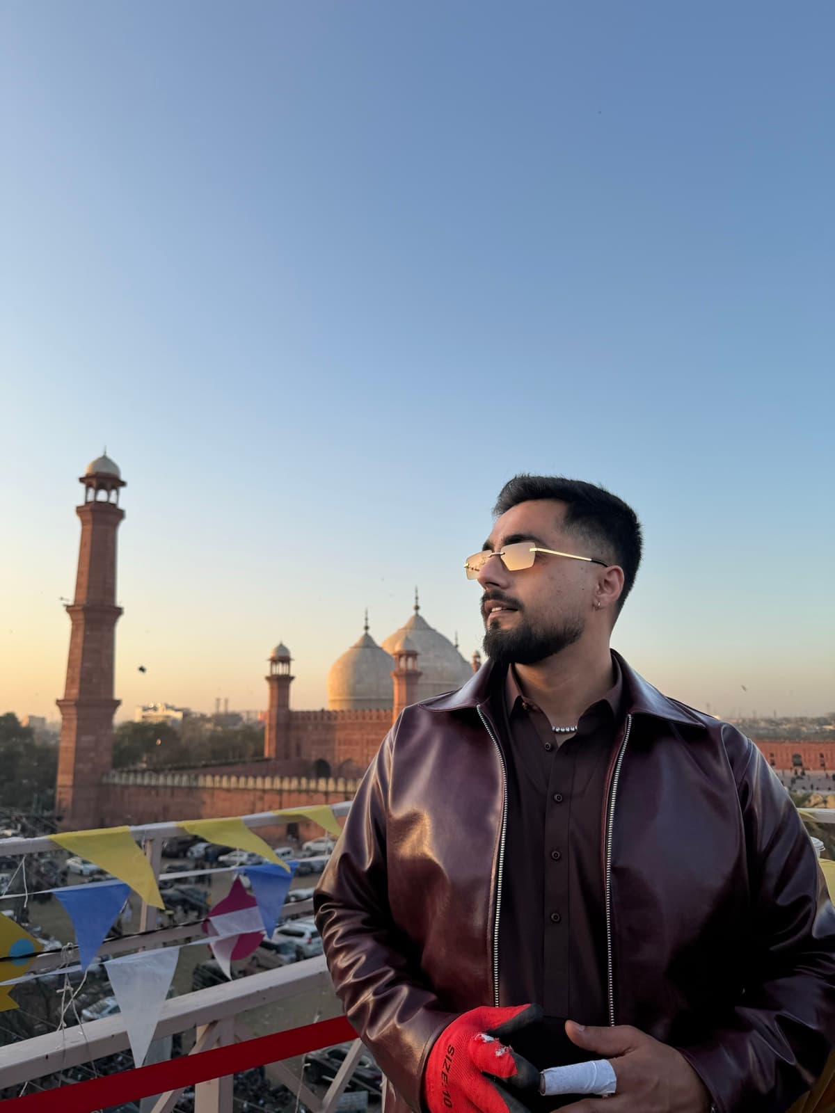 TOSHI at the Badshahi Mosque in Lahore at golden hour